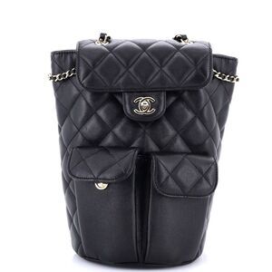Chanel Double Pocket Flap Bucket Backpack Quilted Caviar Black